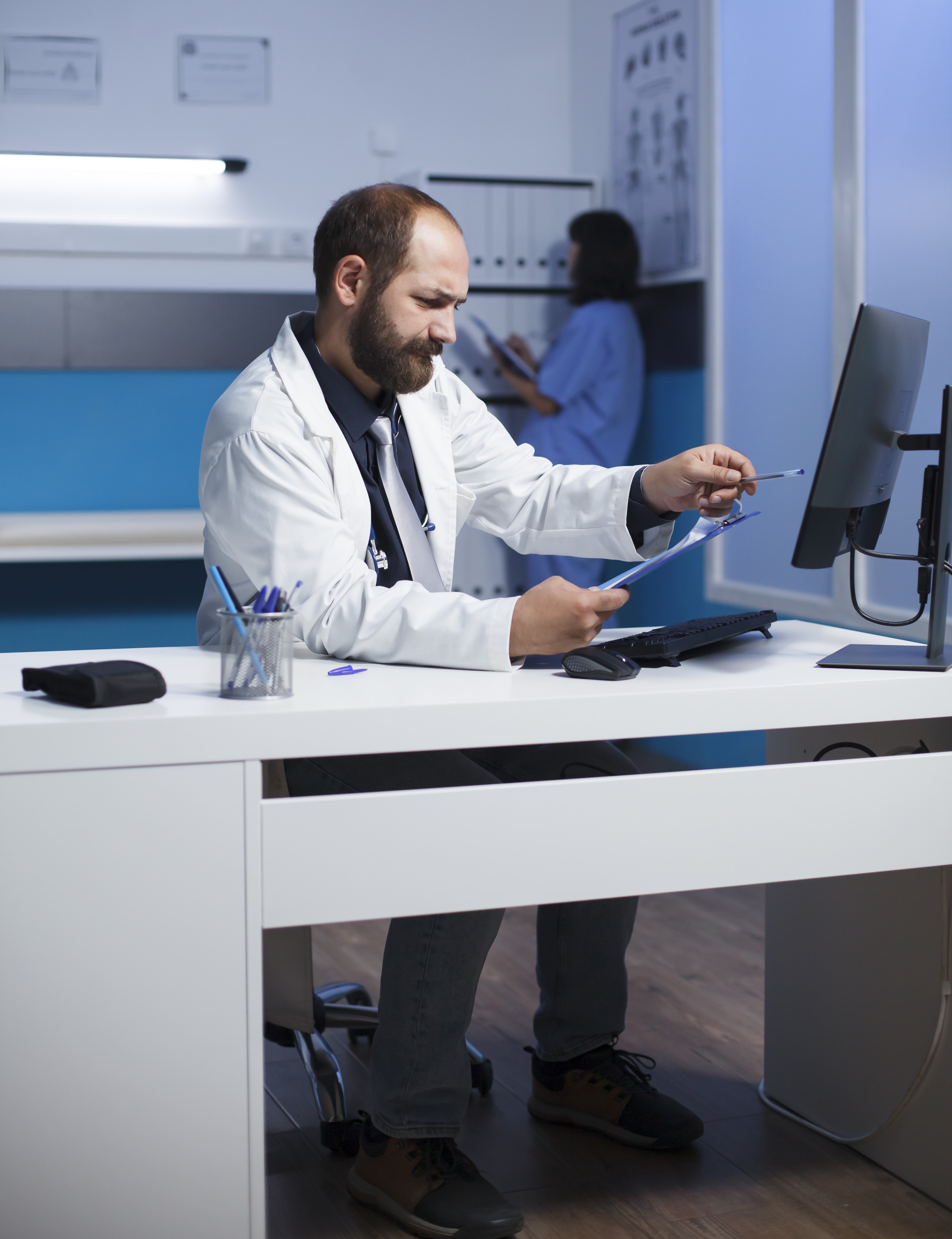 Doctor working on laptop